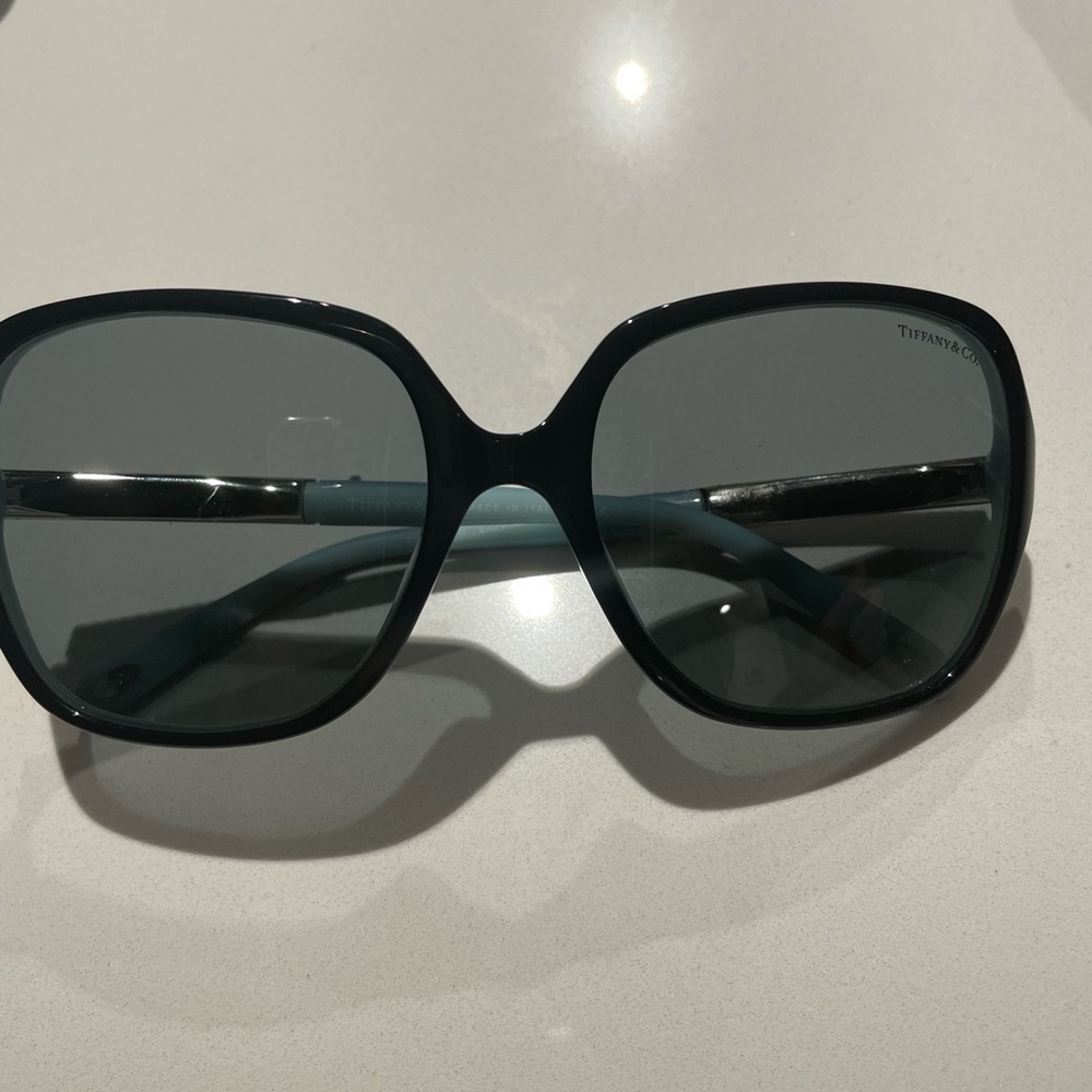 Never worn Tiffany sunglasses! Gorgeous shape.